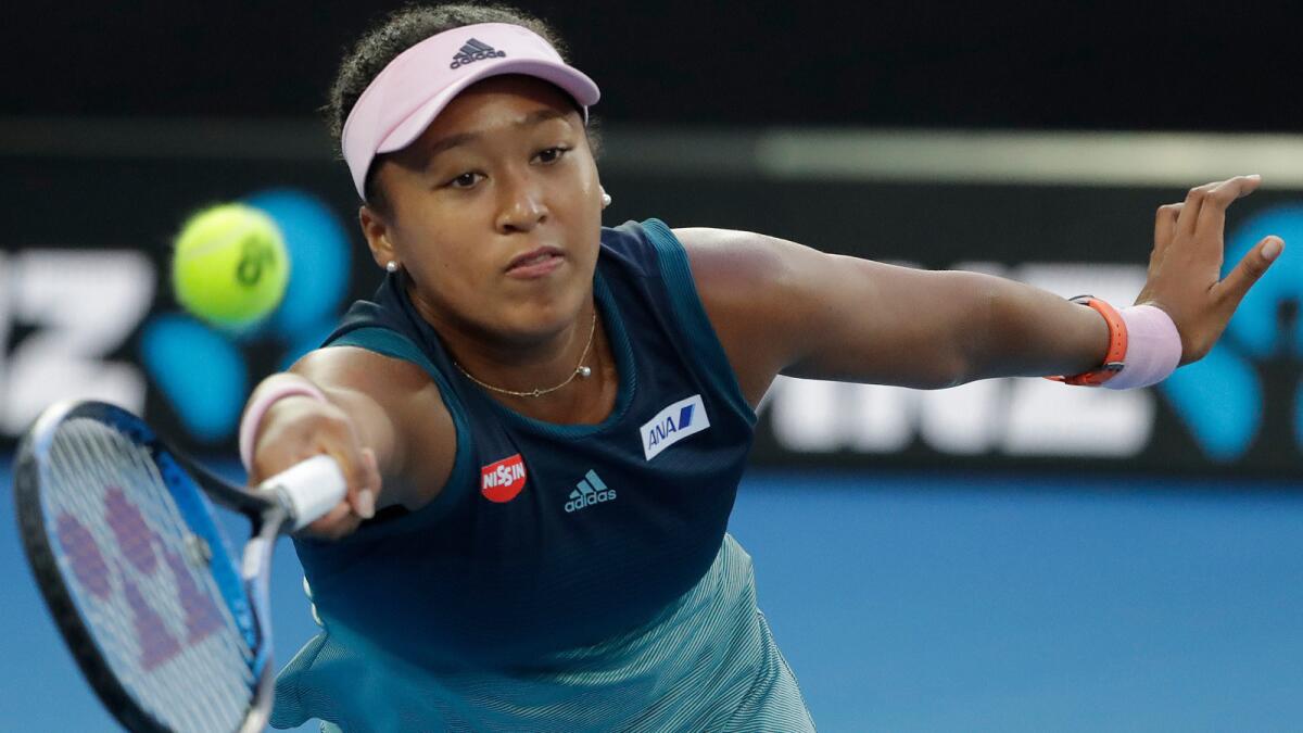 Naomi Osaka of Japan in action during her women's singles final match against Petra Kvitova of the Czech Republic at the Australian Open in Melbourne,