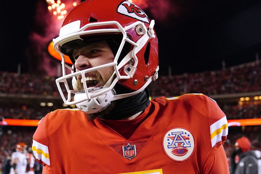 Kansas City Chiefs place kicker Harrison Butker celebrates after the NFL AFC Championship playoff football game against the Cincinnati Bengals, Sunday, Jan. 29, 2023, in Kansas City, Mo. The Chiefs won 23-20. (AP Photo/Brynn Anderson)