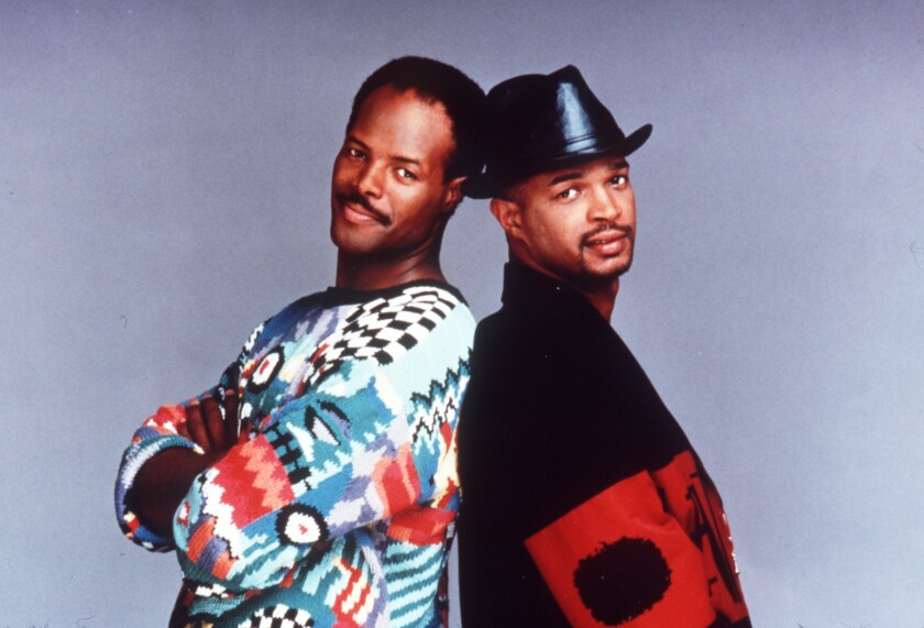 Keenen and Damon Wayans from "In Living Color" stand back-to-back.
