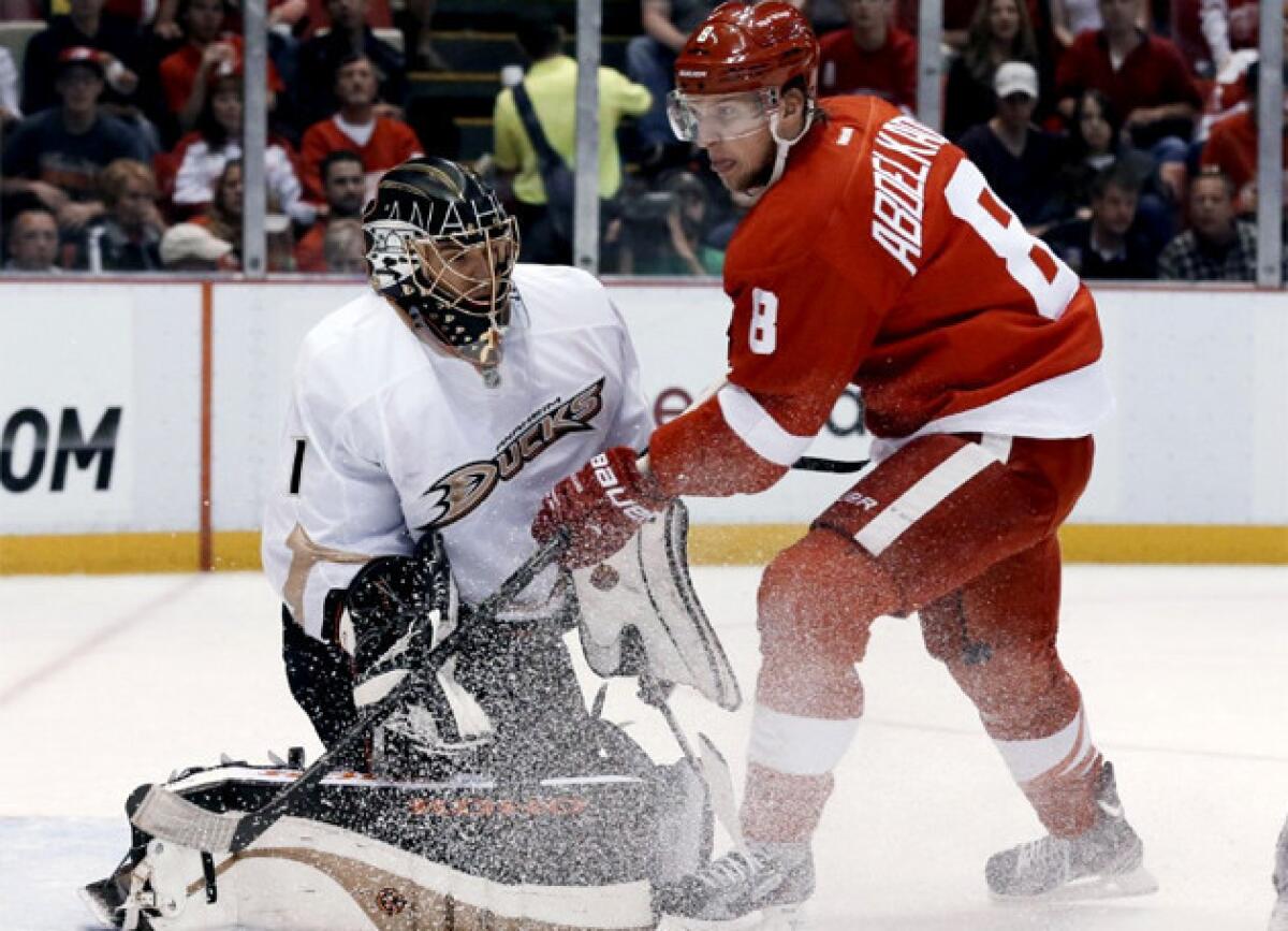 Anaheim Ducks goalie Jonas Hiller stops a shot by Detroit Red Wings' Justin Abdelkader during the second period.