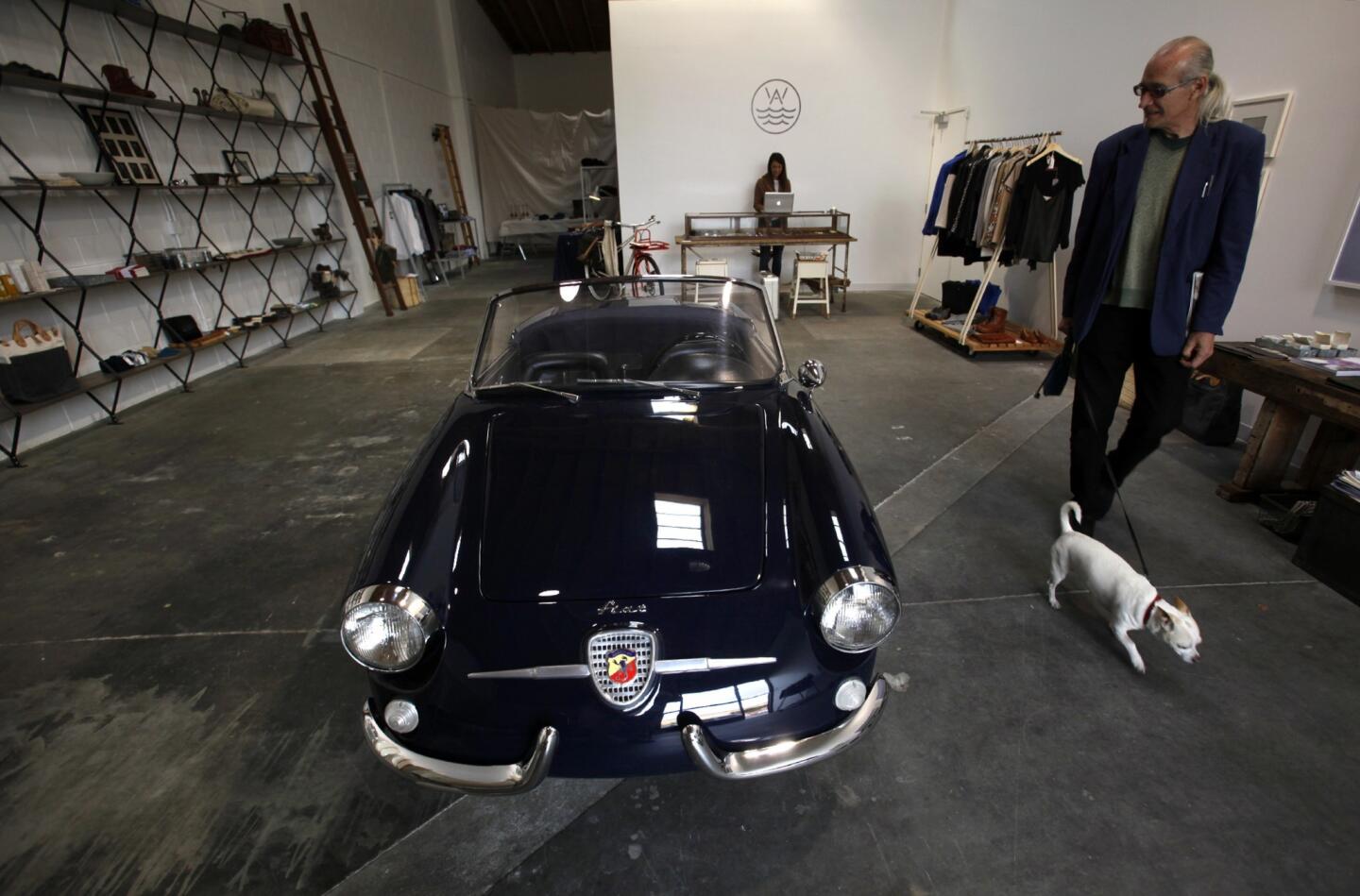 This smartly styled design gallery opened two weeks ago with an eclectic mix including furniture by downtown designer Tim Campbell, ceramics by Echo Park potter Victoria Morris and made-in-L.A. Weiss watches. "It's a California edit on everything," creative director Raan Parton said. One exception: The 1959 Fiat Abarth 750 Spider sitting in the middle of the modern, skylighted space. Here, Drew Lesso walks past the car, which is for sale.