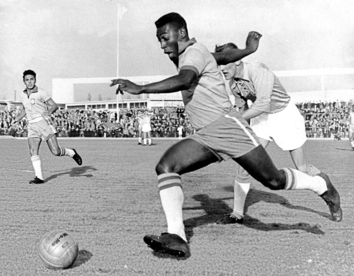 Picture dated 08 May 1960 shows Brazilian soccer star Edson Arantes do Nascimento, better known as Pele, during a match Brazil vs Sweden. The national olympic committees named Pele (soccer), Muhammad Ali (boxing), Carl Lewis (athletics), Michael Jordan (basketball) and Mark Spitz(swimming) the five sportsmen of the century it was reported in a International Olympic Committee statement 17 December 1999.