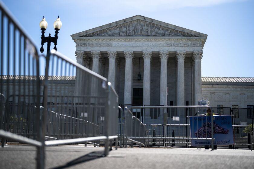 WASHINGTON, DC - MAY 10: Fencing has been up surrounding the Supreme Court of the United States complex on Tuesday, May 10, 2022 in Washington, DC. (Kent Nishimura / Los Angeles Times)