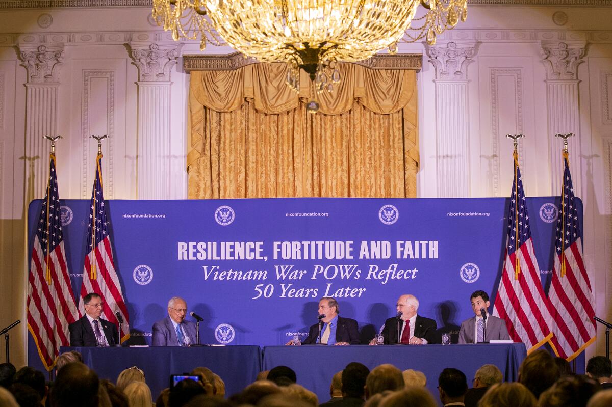 Former prisoners of war take part in a panel discussion at the Richard Nixon Presidential Library.