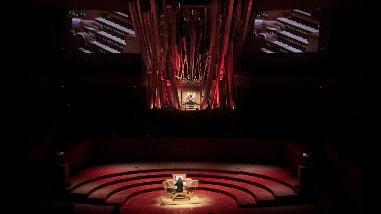 Chelsea Chen, top, and Christoph Bull perform together at Walt Disney Concert Hall. They were part of a nine-organist celebration Nov. 23 that capped off the "Happy Birthday Hurricane Mama" festivities marking the 10th anniversary of the impressive instrument.
