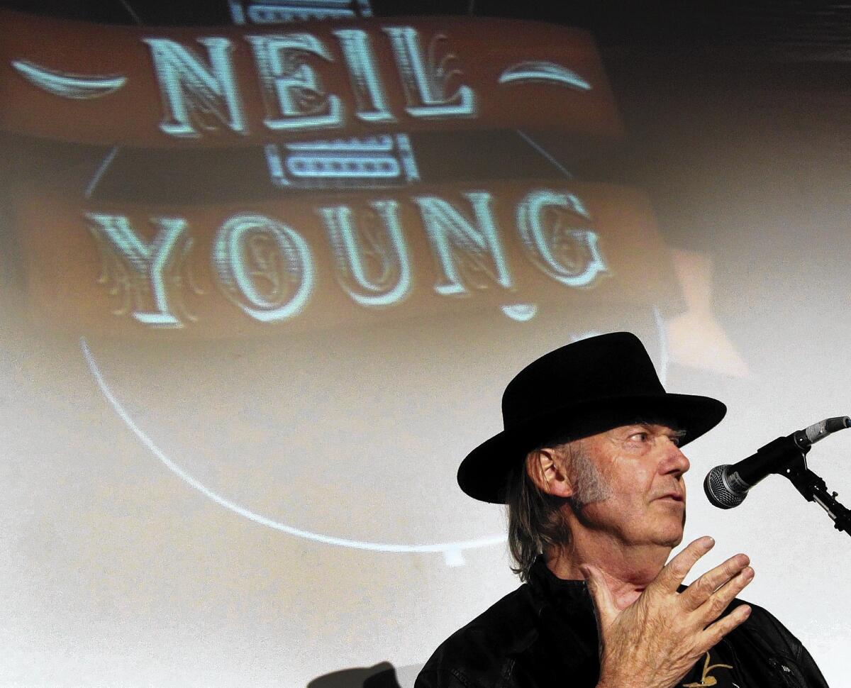 NEIL YOUNG regaled producers and engineers with history as they gave him the President’s Merit Award.