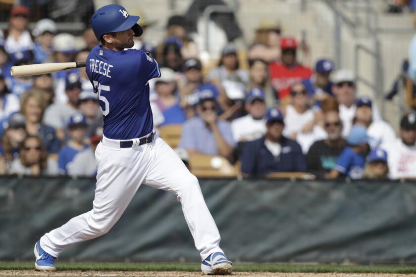Los Angeles Dodgers' David Freese hits during a spring training baseball game against the Los Angeles Angels, Sunday, Feb. 24, 2019, in Glendale, Ariz. (AP Photo/Darron Cummings)