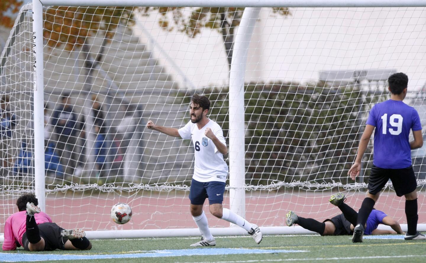 Crescenta Valley High School soccer player #6 Sebouh Oshagan celebrates scoring a goal in game vs. Hoover High School at home in La Crescenta on Tuesday, December 6, 2016.