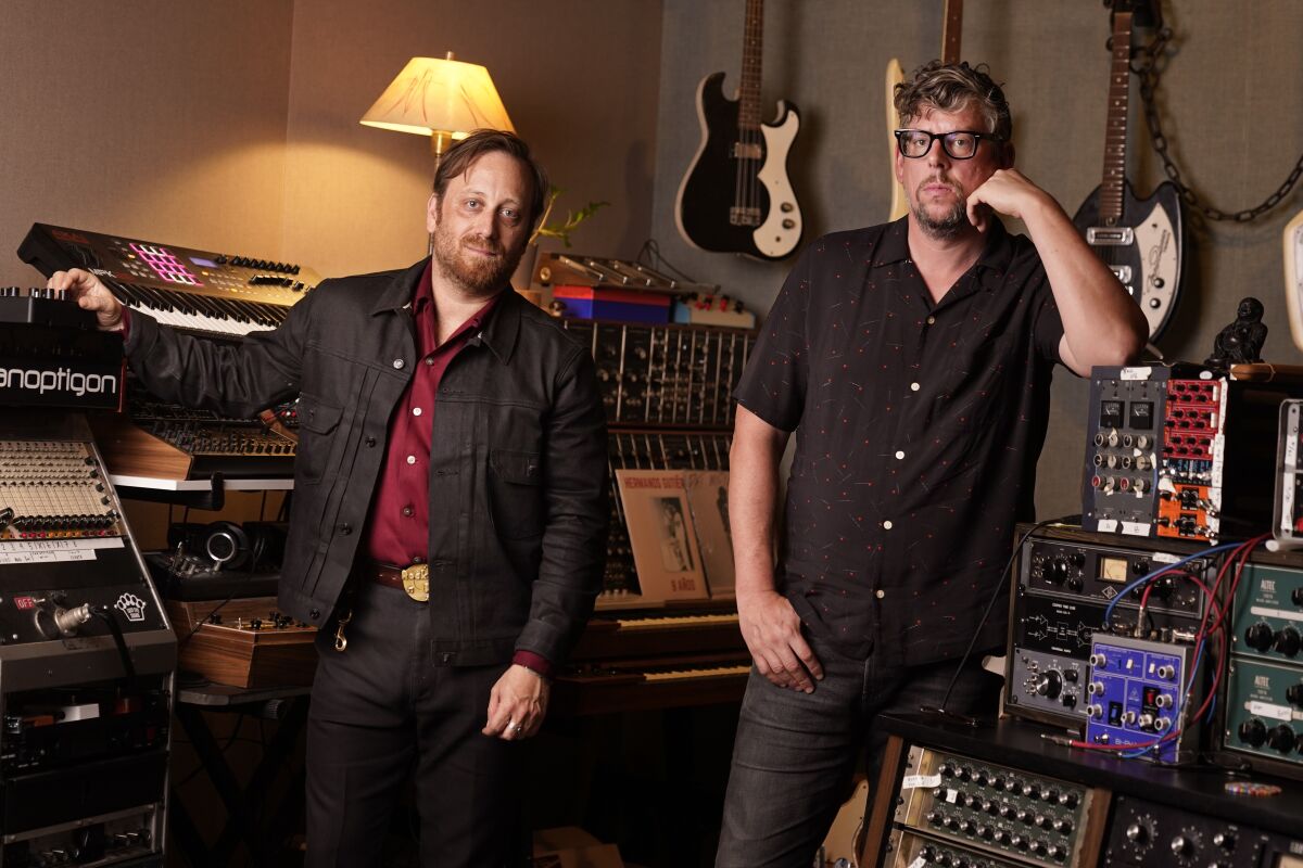 Dan Auerbach, left, and Patrick Carney of The Black Keys pose in Nashville, Tenn., on April 20, 2022, to promote their 11th studio record “Dropout Boogie." (AP Photo/Mark Humphrey)