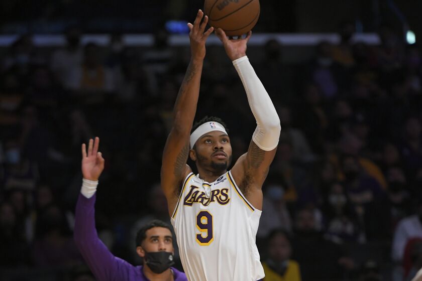 Los Angeles Lakers forward Kent Bazemore (9) takes a jumpshot against the Phoenix Suns.