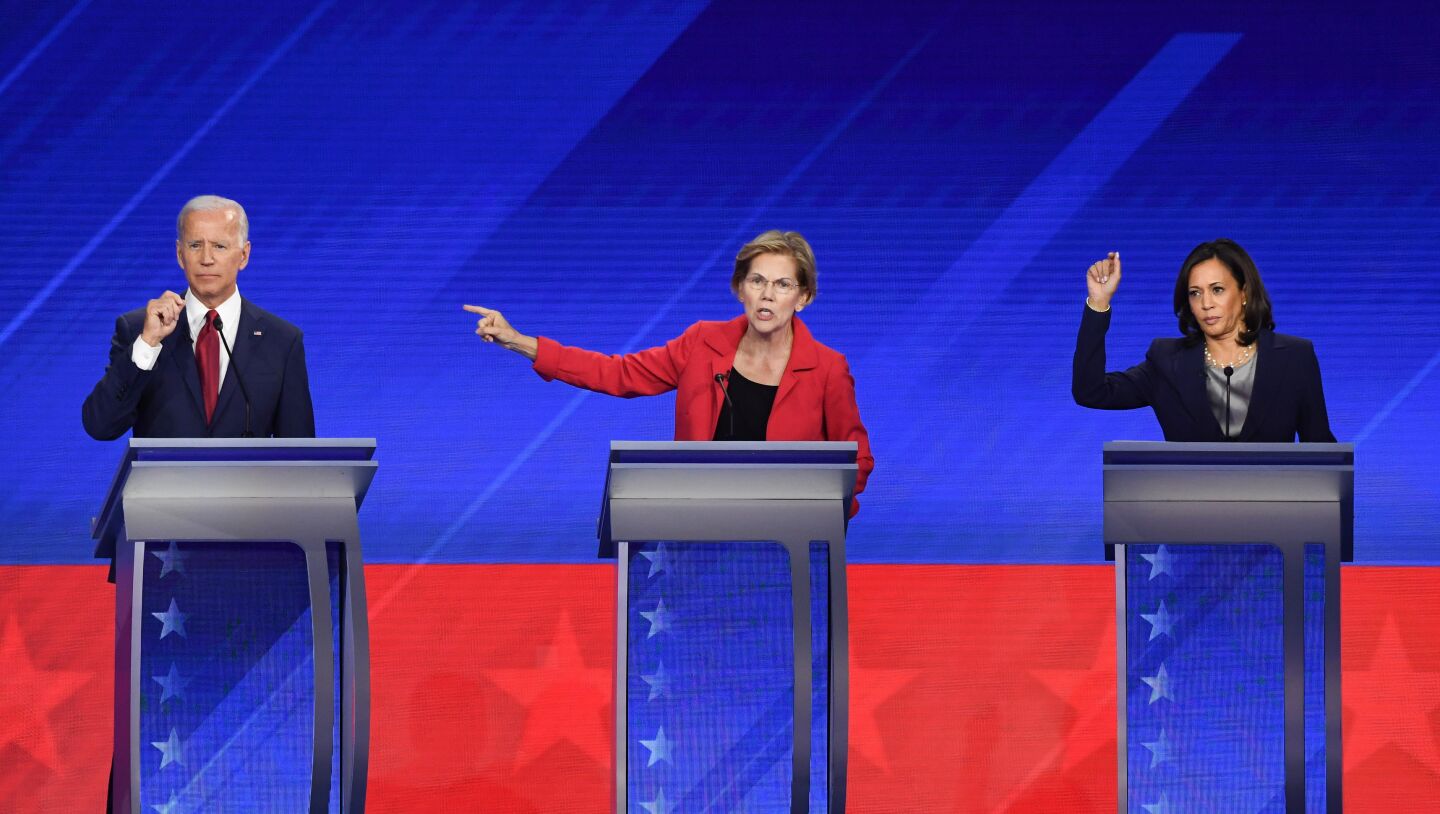 Democratic presidential hopefuls Former Vice President Joe Biden (L), Massachusetts Senator Elizabeth Warren (C) and California Senator Kamala Harris (R) speak during the third Democratic primary debate of the 2020 presidential campaign season hosted by ABC News in partnership with Univision at Texas Southern University in Houston, Texas on September 12, 2019. (Photo by Robyn BECK / AFP) (Photo credit should read ROBYN BECK/AFP/Getty Images)