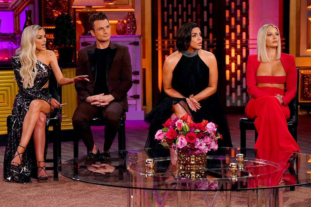 "Vanderpump Rules" stars Lala Kent, James Kennedy, Katie Maloney and Ariana Madix sit on a stage.