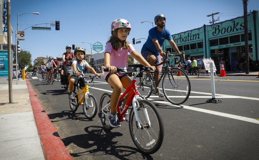 Hundreds ride in North Park’s new protected bikeway, Mayor Gloria pushes to replicate project across city - The San Diego Union-Tribune 2 Protected bike lanes have opened from Polk Street in North Park to Juniper Street in South Park.