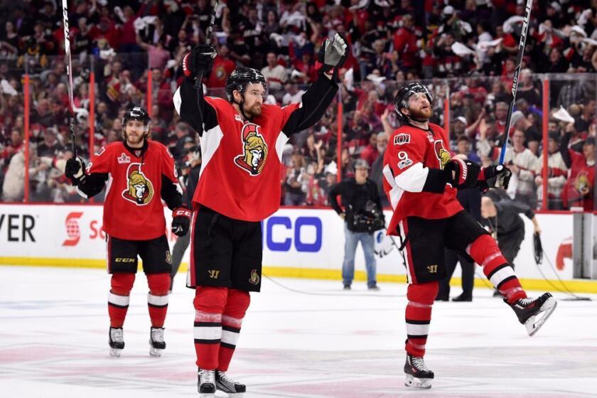 OTTAWA, ON - MAY 23: Chris Wideman #6 and Bobby Ryan #9 of the Ottawa Senators celebrate after defeating the Pittsburgh Penguins with a score of 2 to 1 in Game Six of the Eastern Conference Final during the 2017 NHL Stanley Cup Playoffs at Canadian Tire Centre on May 23, 2017 in Ottawa, Canada. (Photo by Minas Panagiotakis/Getty Images) ** OUTS - ELSENT, FPG, CM - OUTS * NM, PH, VA if sourced by CT, LA or MoD **