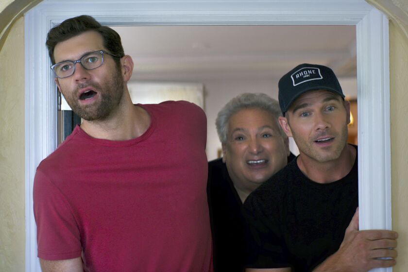 This image released by Universal Pictures shows, from left, Billy Eichner, Harvey Fierstein and Luke Macfarlane in a scene from "Bros." (Universal Pictures via AP)