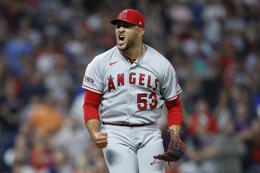 Angels closer Carlos Estévez celebrates a 5-4 win against the Guardians on May 12, 2023, in Cleveland.