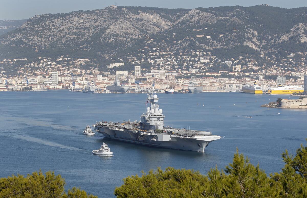 France's aircraft carrier Charles de Gaulle leaves its home port of Toulon in 2015.