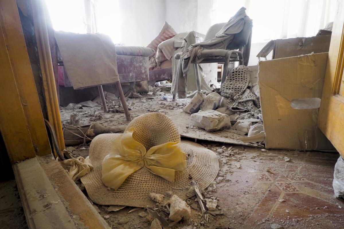 A view of a room of a house damaged by shelling in Stepanakert. 