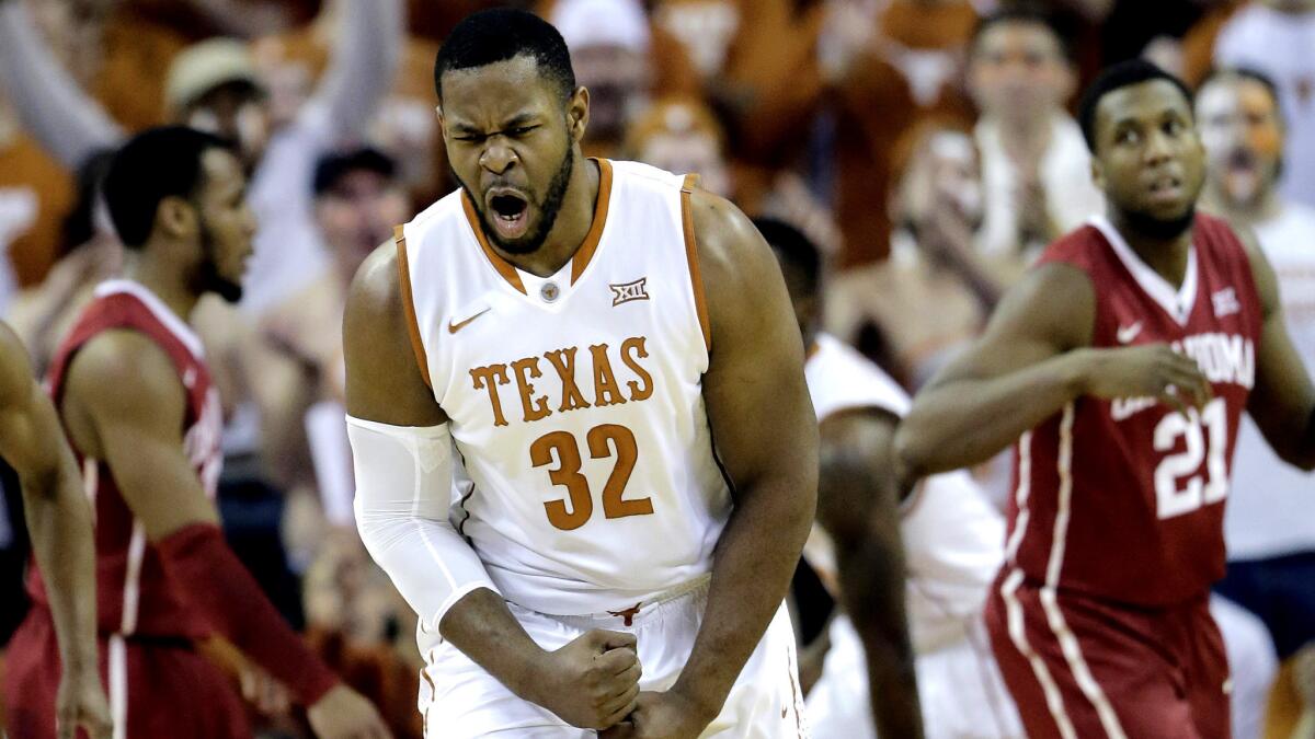 Texas forward Shaquille Cleare celebrates after scoring against Oklahoma on Saturday.