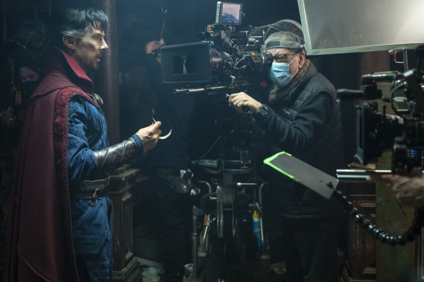 Benedict Cumberbatch on set with director Sam Raimi in Doctor Strange 2