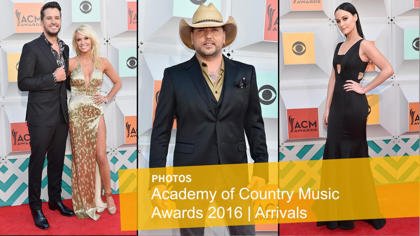 Co-host Luke Bryan with Caroline Boyer, left, Jason Aldean and Kacey Musgraves attend the 51st Academy of Country Music Awards at MGM Grand Garden Arena in Las Vegas.