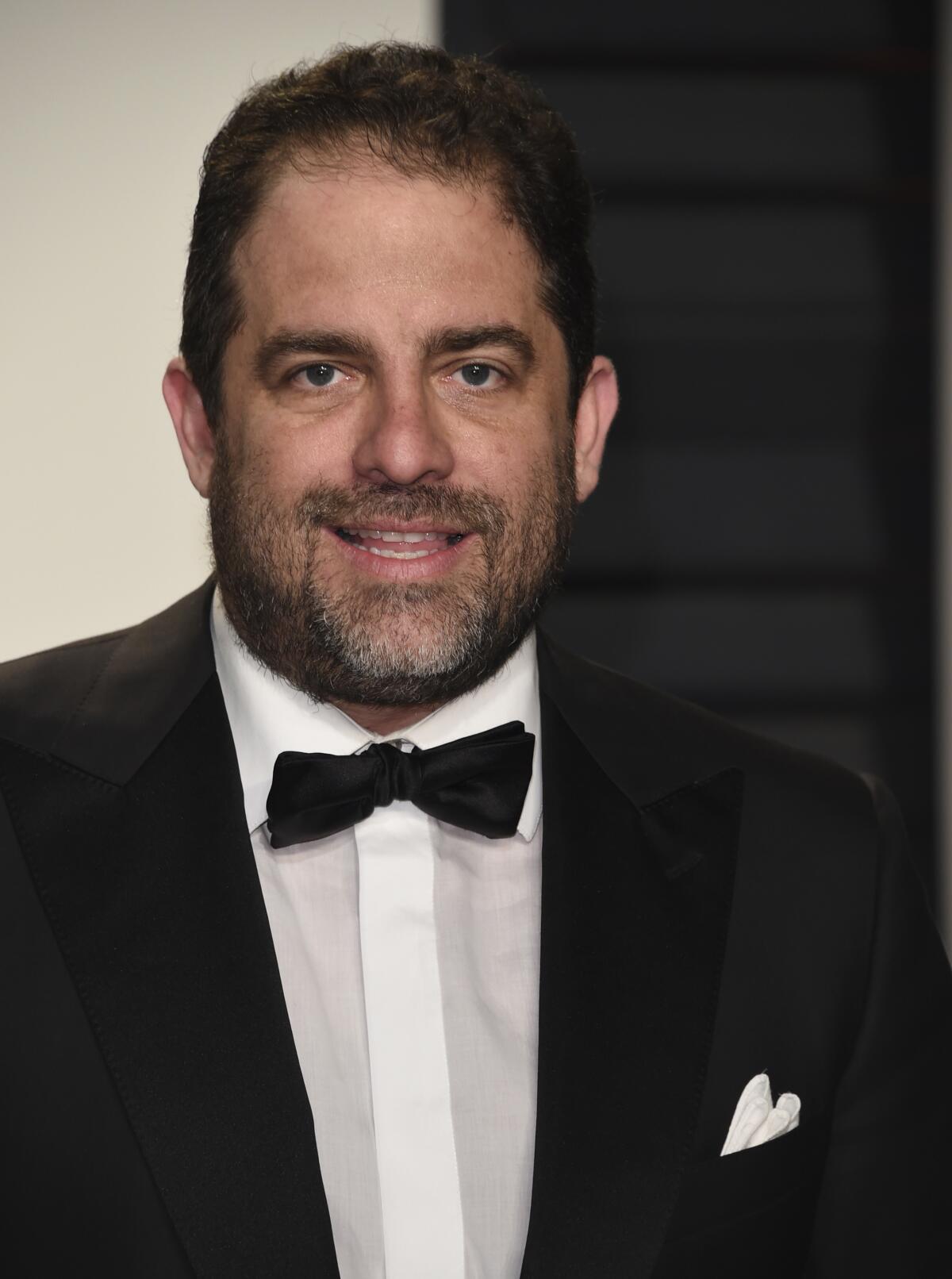 Director Brett Ratner wearing a tuxedo. 