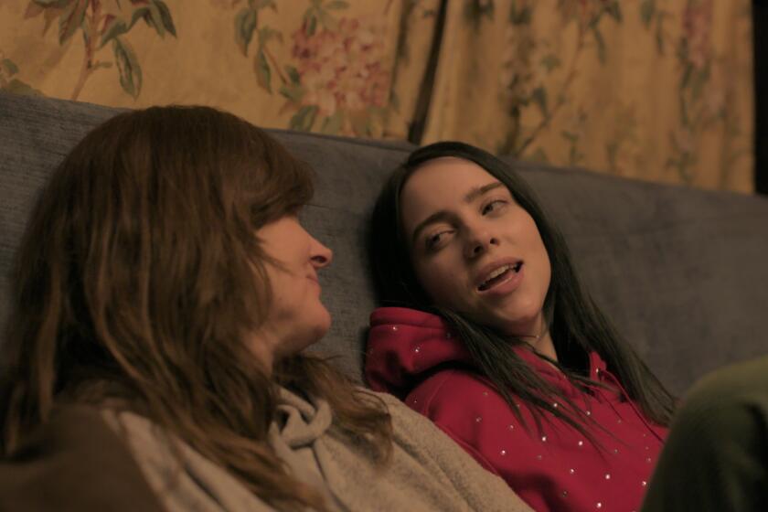 Billie Eilish and her mother, Maggie Baird, in a scene from "The World's a Little Blurry."
