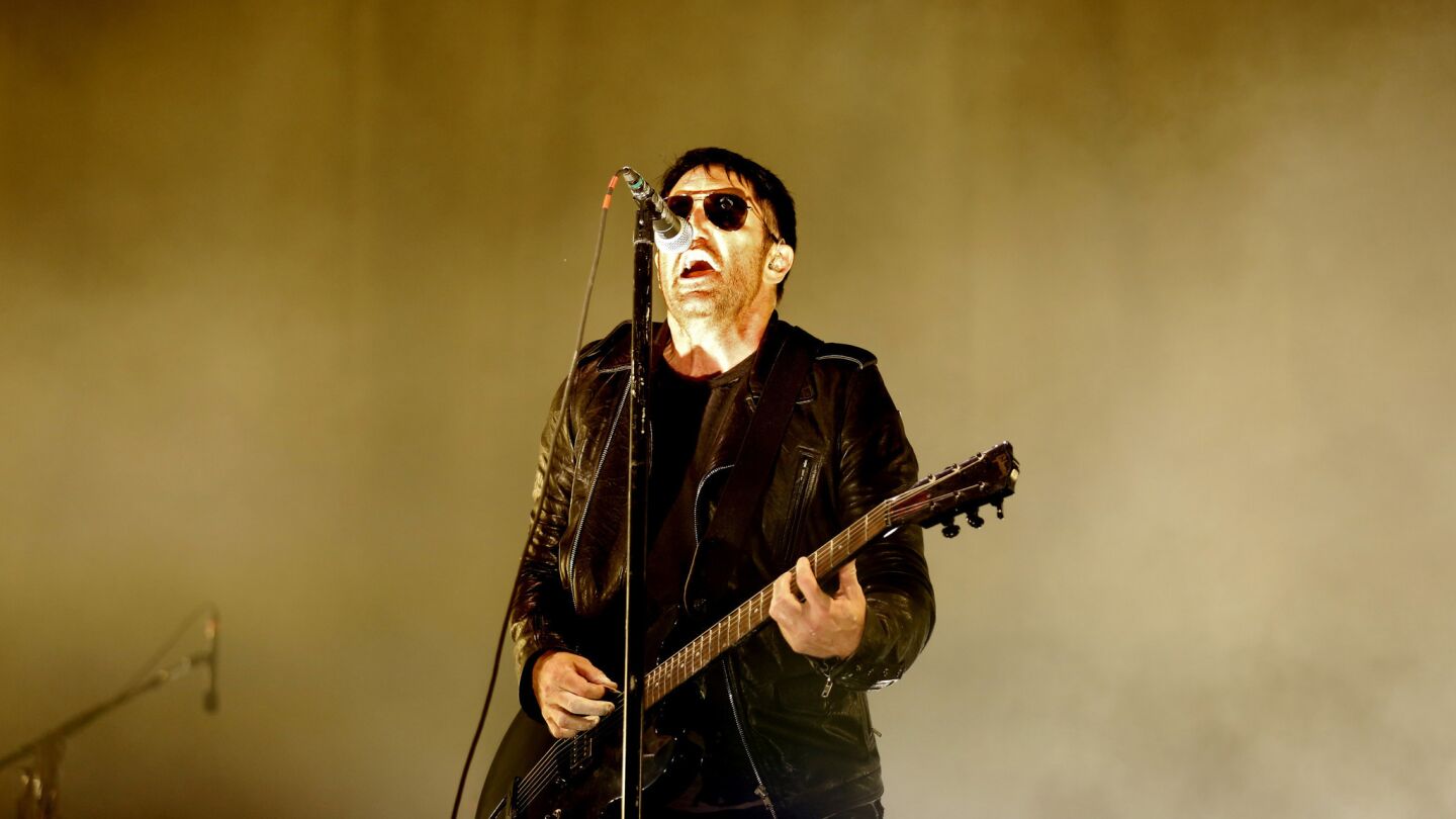 Nine Inch Nails frontman Trent Reznor performs.