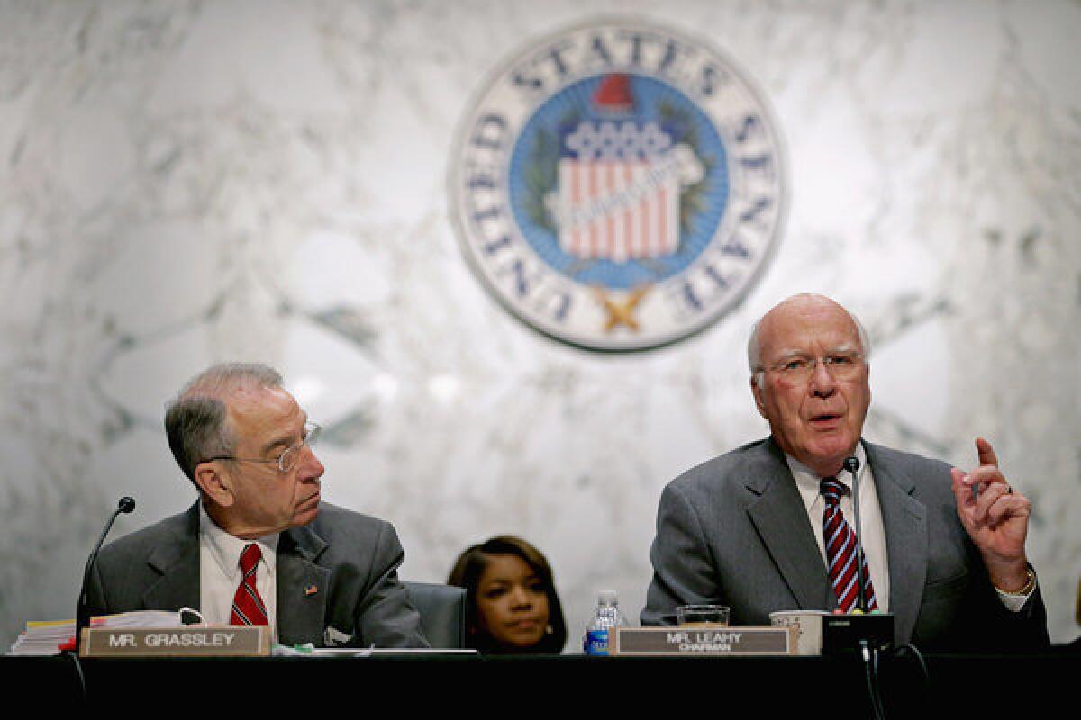 Sen. Patrick J. Leahy (D-Vt.) makes a point during a committee hearing on immigration reform. At left is Sen. Charles E. Grassley (R-Iowa).