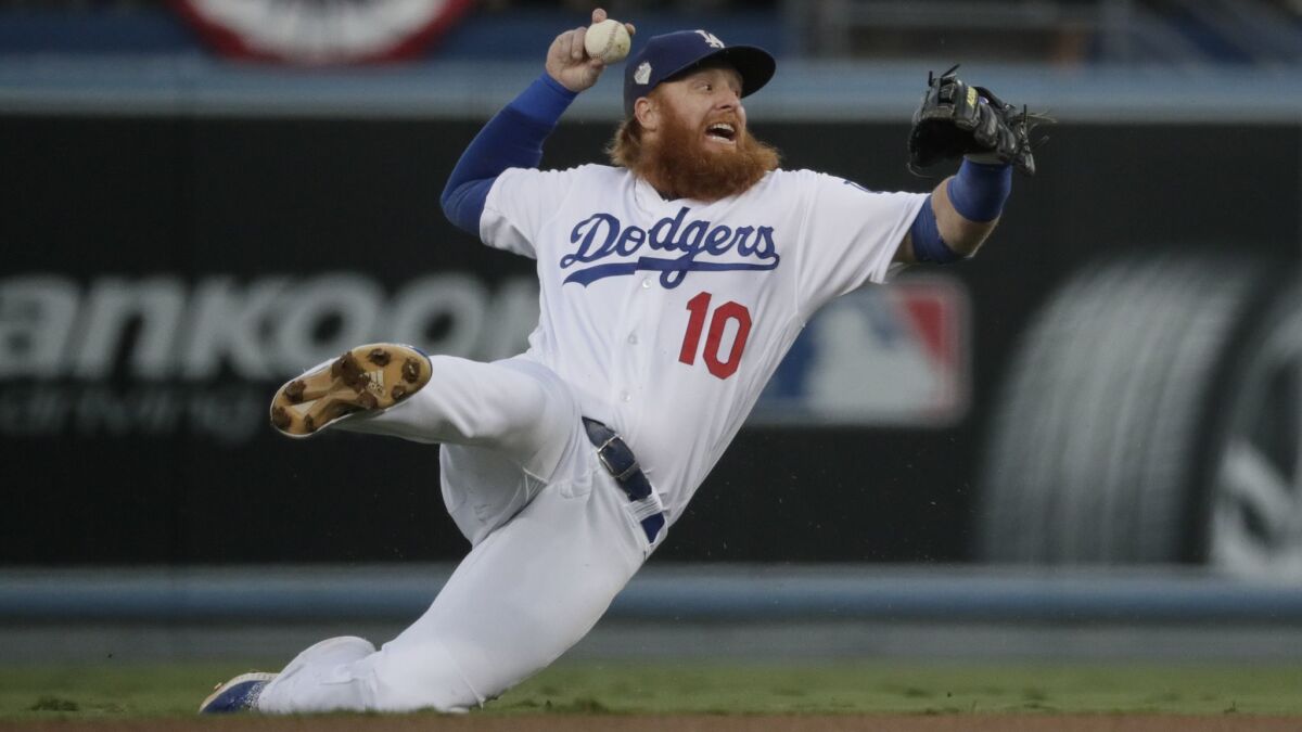 Dodgers third baseman Justin Turner makes a throw during Game 3 of the World Series against the Boston Red Sox in October.