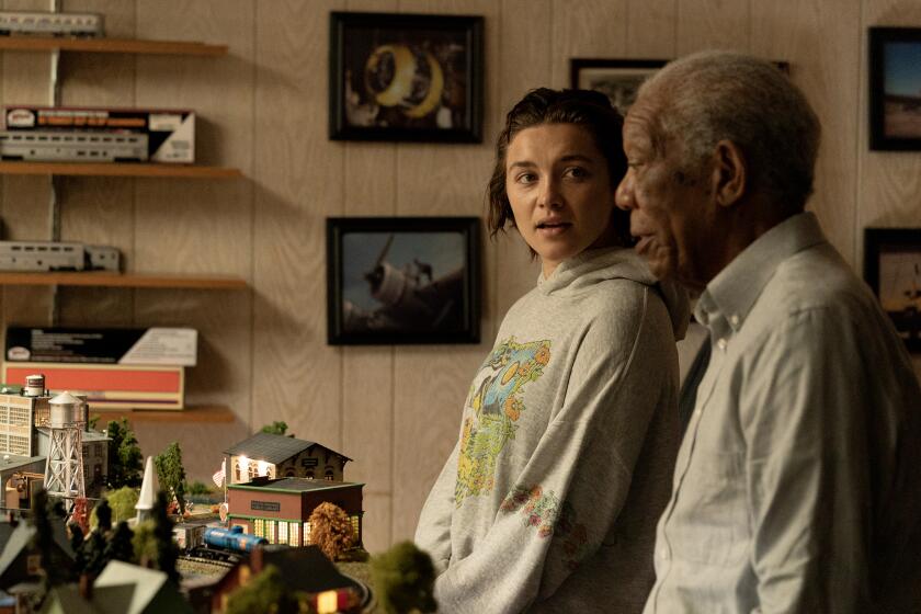 Florence Pugh, left, and Morgan Freeman in "A Good Person." MUST CREDIT: Jeong Park/Metro Goldwyn Mayer Pictures