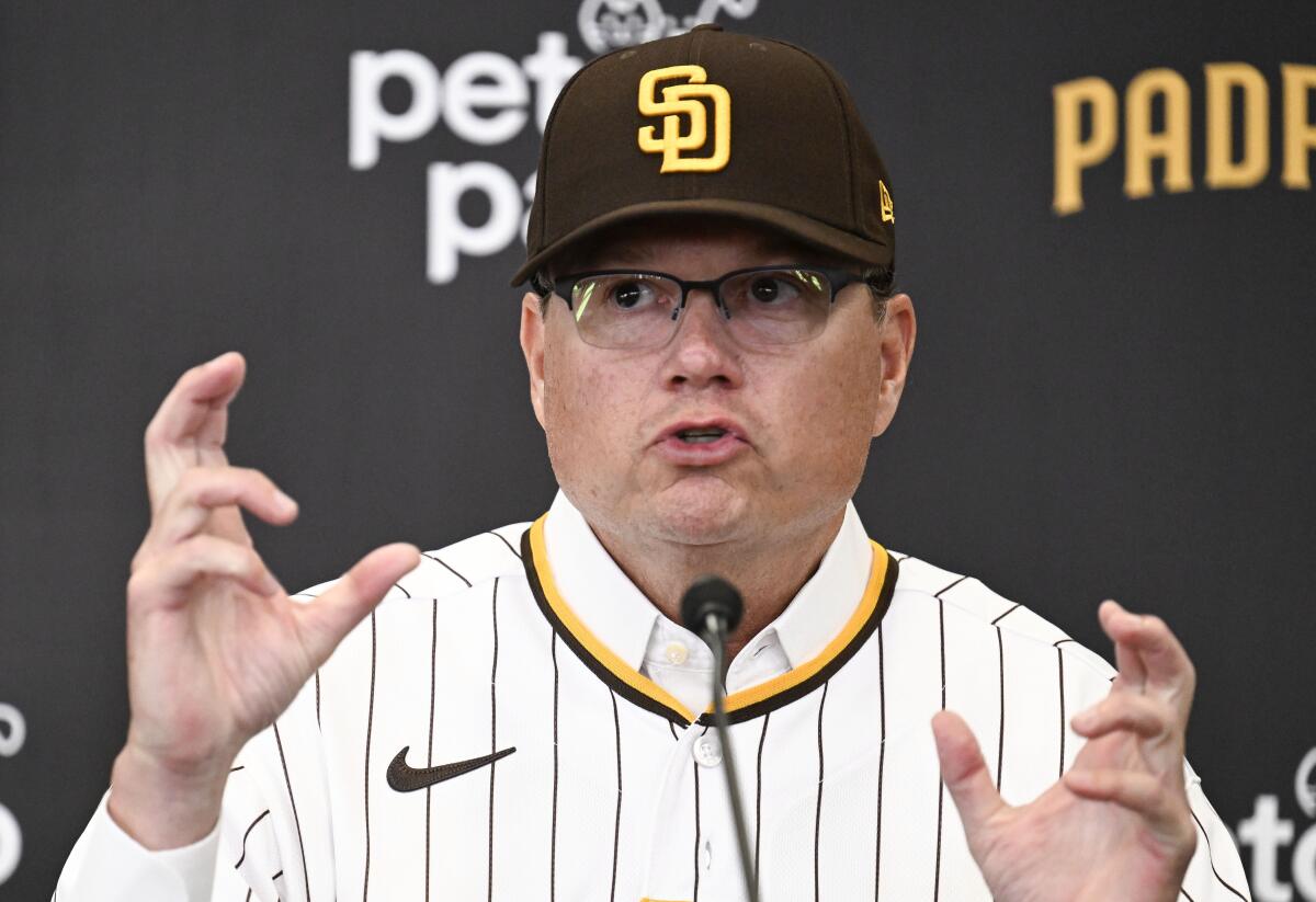 New San Diego Padres manager Mike Shildt wears a jersey and gestures with hands while speaking during a news conference 