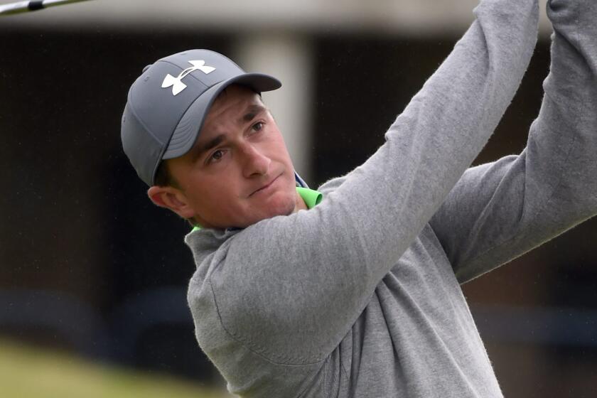 Amateur Paul Dunne hits from the fairway during the final round of the British Open at St. Andrews, Scotland, on Monday.