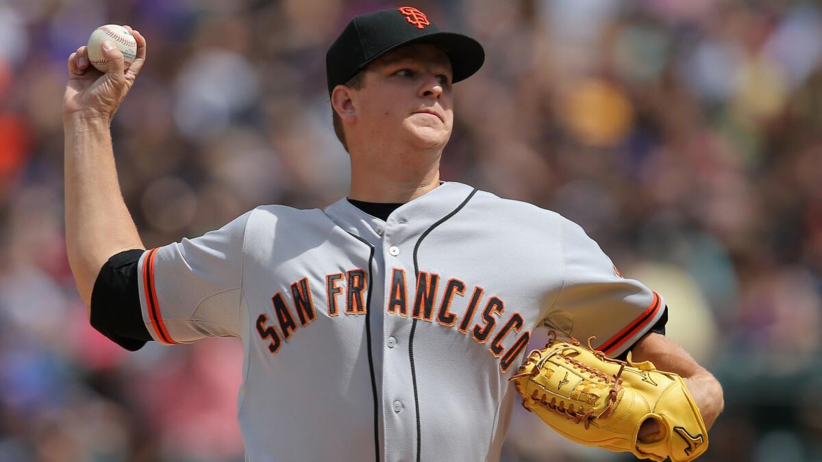 San Francisco Giants pitcher Matt Cain delivers a pitch during a game against the Colorado Rockies in April.