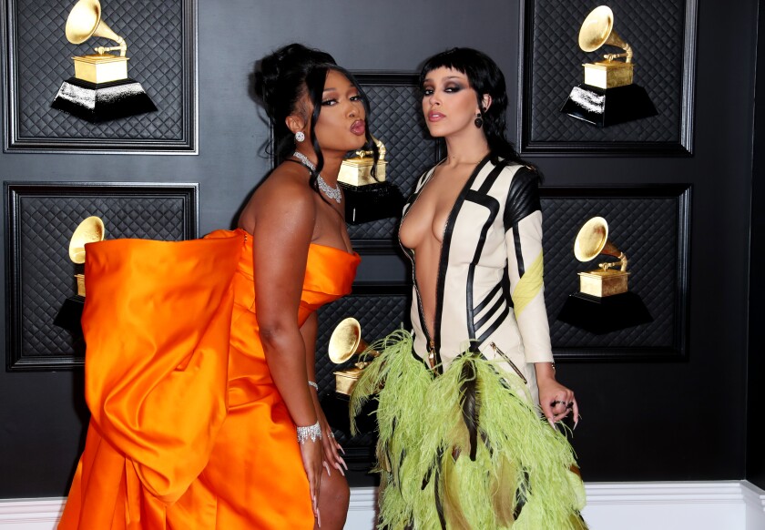 Megan Thee Stallion, left, and Doja Cat on the red carpet at the 63rd Grammy Awards.