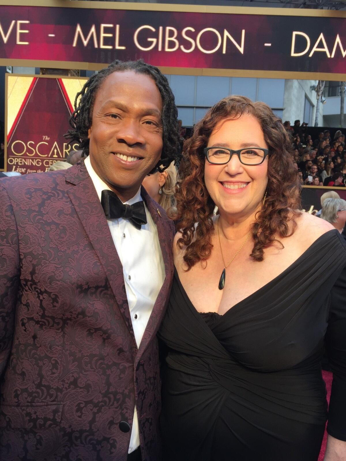 "Life, Animated" director Roger Ross Williams (L) and producer Julie Goldman (R)