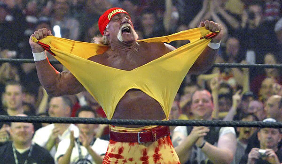 Hulk Hogan does his shirt-ripping thing at 'WrestleMania 21' in 2005.