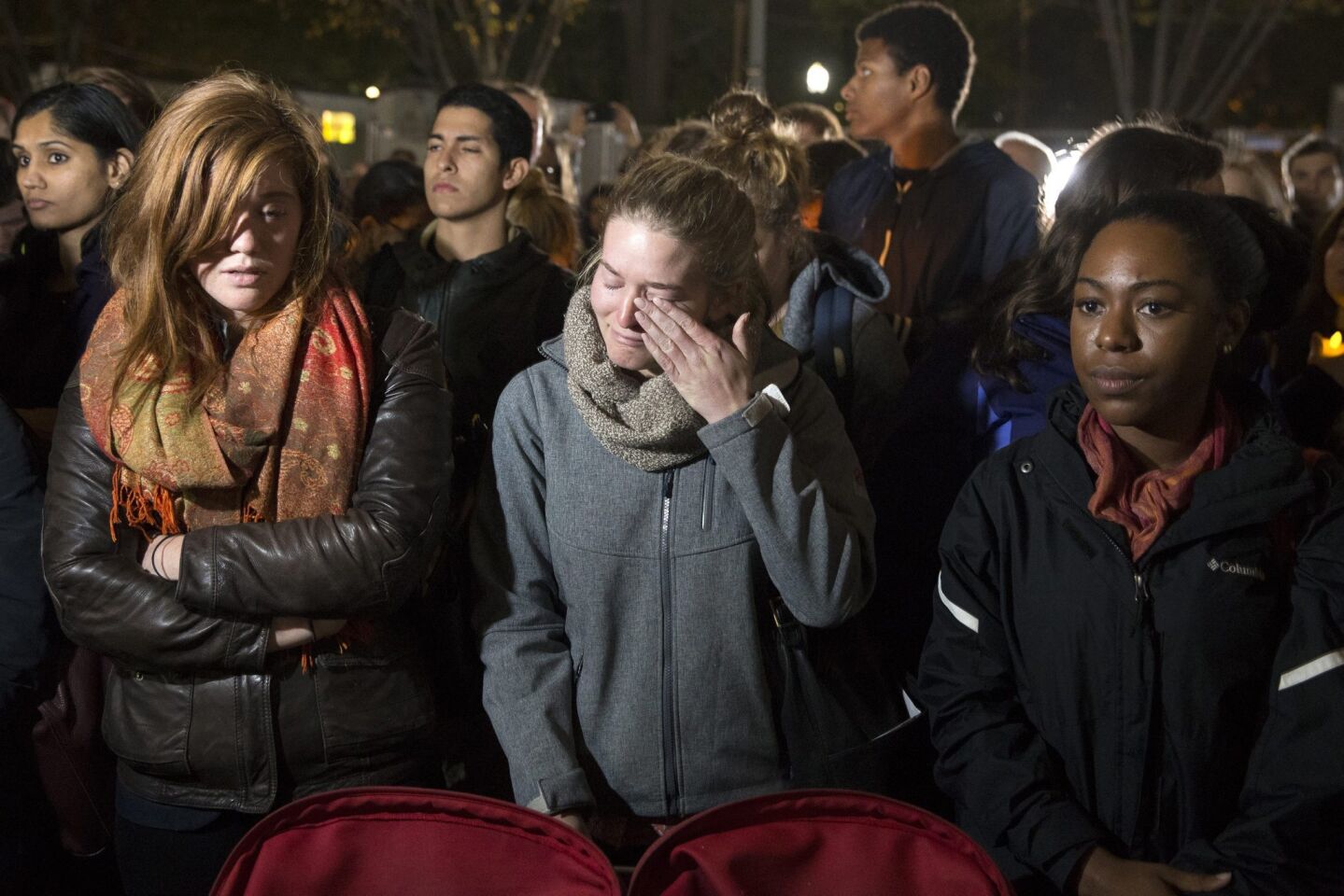 Tears are shed at the postelection candlelight vigil outside the White House.