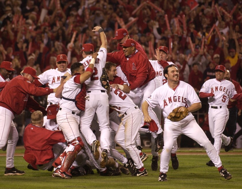 Angels players celebrate after defeating the San Francisco Giants in Game 7 for the 2002 World Series title.