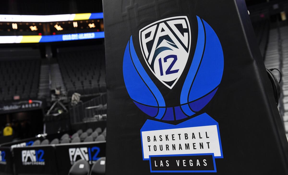 A Pac-12 basketball logo is shown on a stanchion before a semifinal game of the of the Pac-12 basketball tournament.