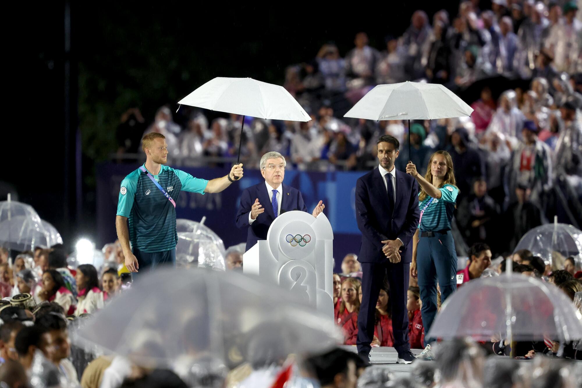 Thomas Bach, President of the International Olympic Committee, gives a speech at the Trocadero during the opening ceremony.