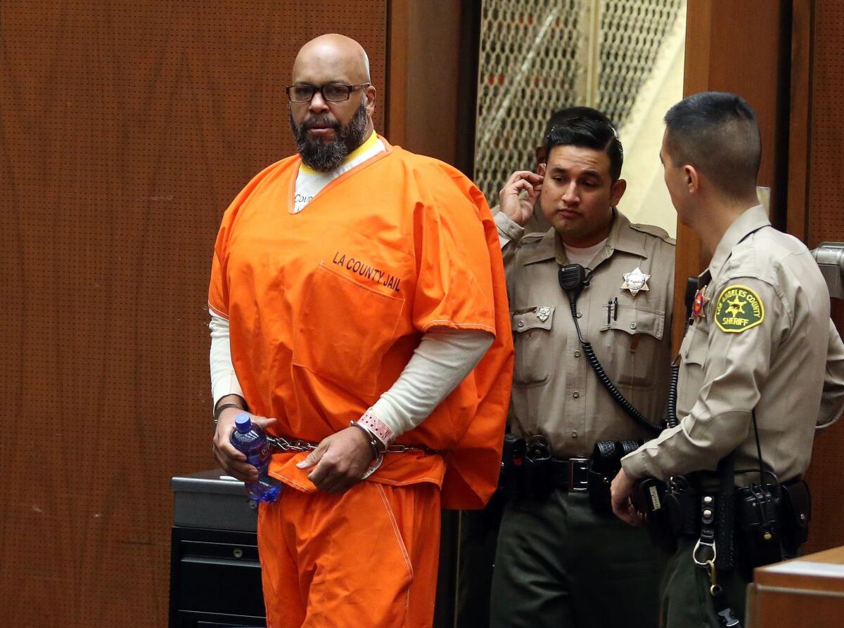 Marion "Suge" Knight appears in Los Angeles court for a pretrial hearing on Thursday. Knight has a new lawyer in a murder case.