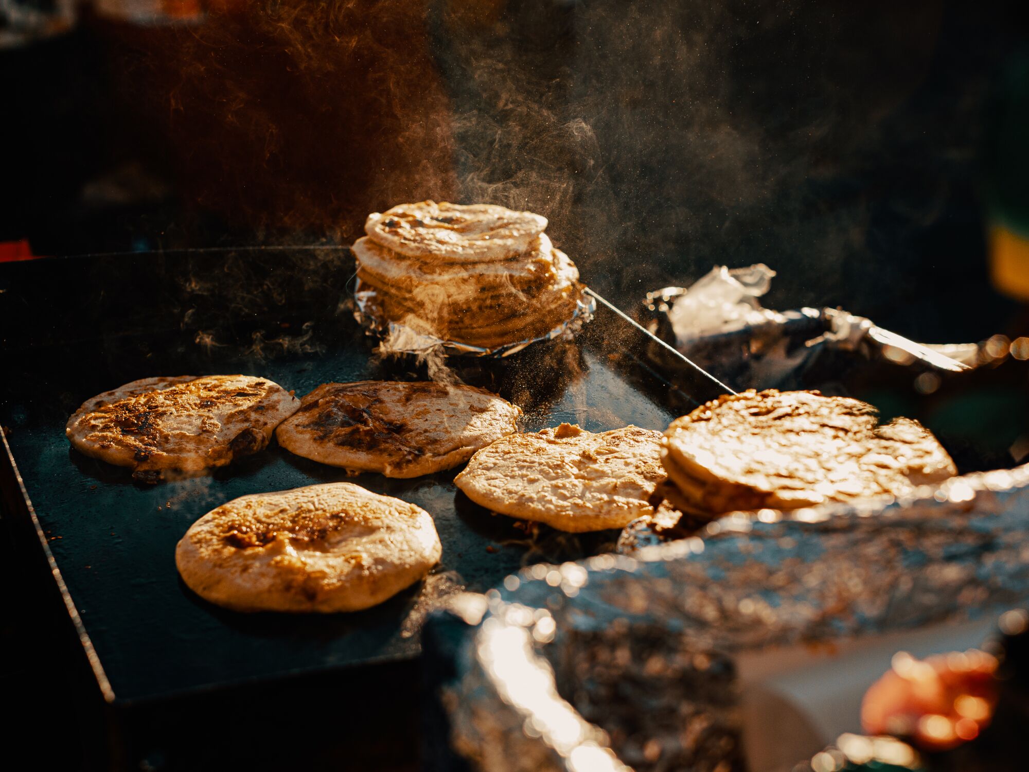 Pupusas sizzling at McArthur Park.