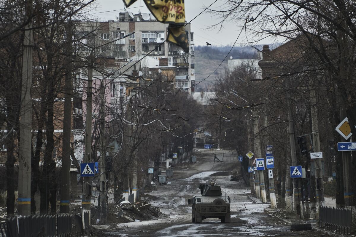 A Ukrainian Humvee rumbling through the city of Bakhmut