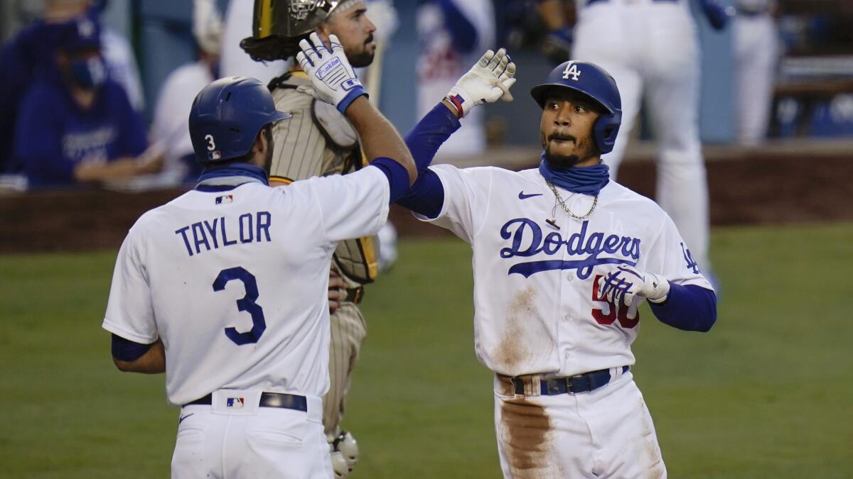 Mookie Betts hits 2 HRs as Dodgers beat Marlins 3-1 to complete