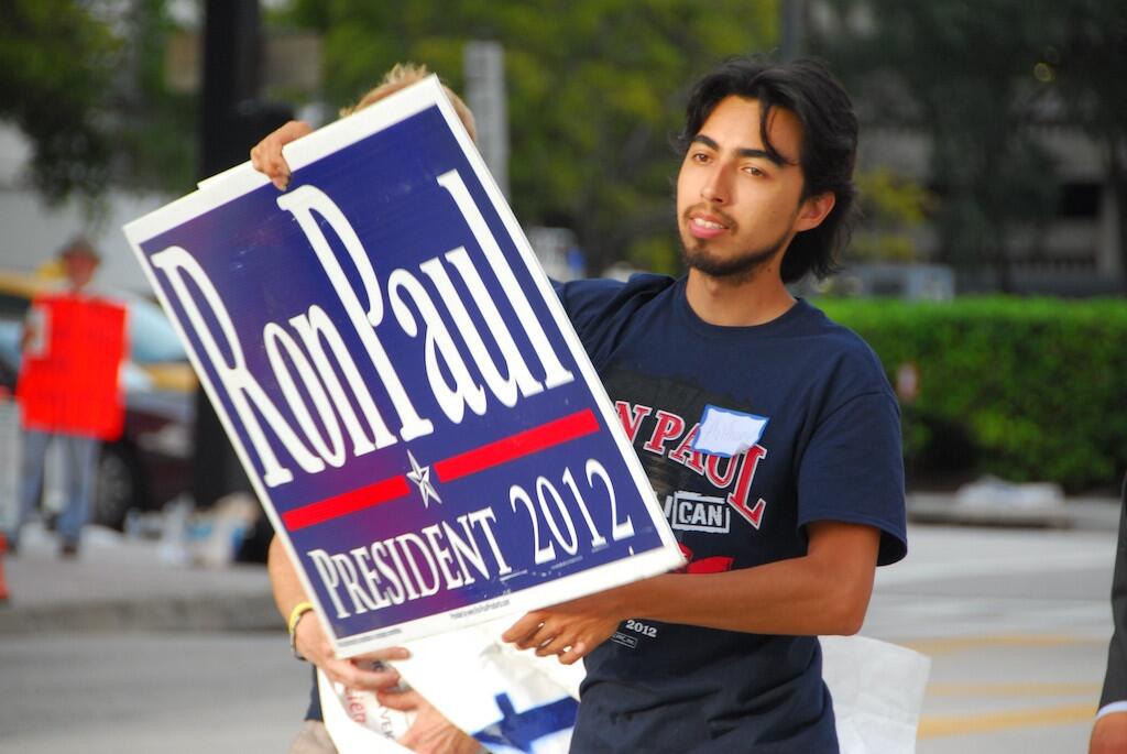 A Ron Paul supporter makes his case outside the Tampa Bay Times Forum on Aug. 29, 2012.