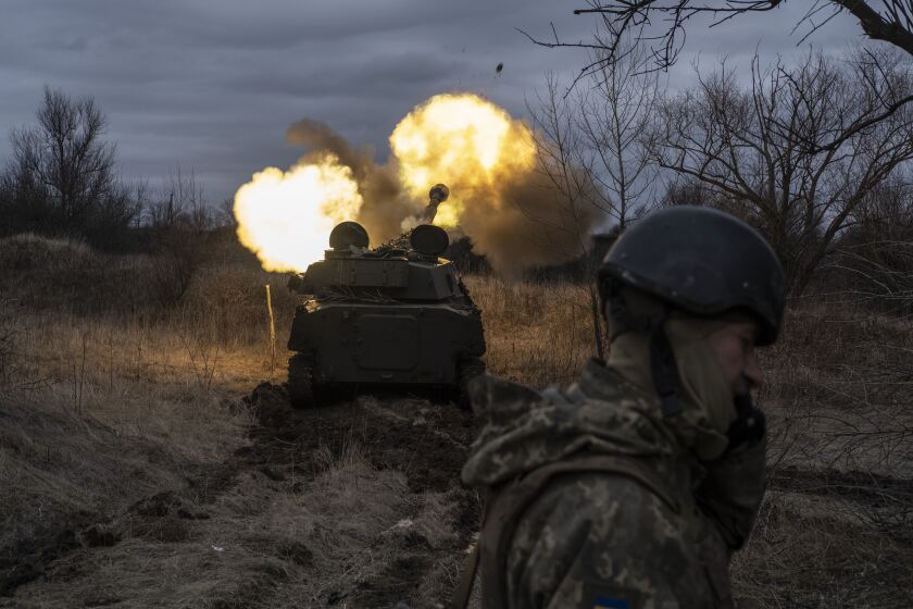 A Ukrainian self-propelled artillery vehicle fires on the frontline, Donetsk region, Ukraine, Thursday, March 2, 2023.(AP Photo/Iryna Rybakova)