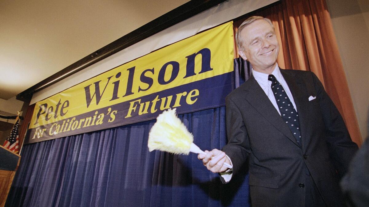 Then-Gov. Pete Wilson after a news conference in Los Angeles in 1994.