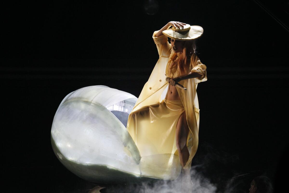 A French artist is subpoenaing members of Lady Gaga's creative team, alleging that the singer plagiarized some of her ideas. Lady Gaga is seen performing at the Grammy Awards in 2011.