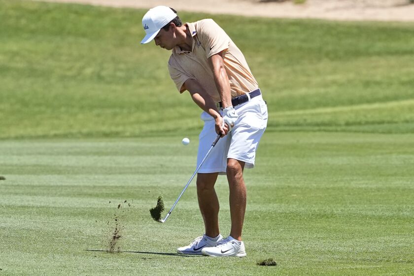 Florida golfer Fred Biondi hits from the second fairway during the final round of the NCAA college men's stroke play golf championship, Monday, May 29, 2023, in Scottsdale, Ariz. (AP Photo/Matt York)